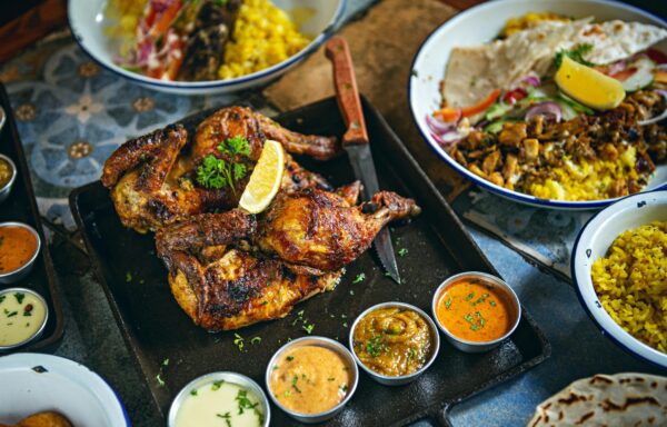 Savor the taste of perfectly grilled chicken paired with a selection of flavorful dipping sauces.